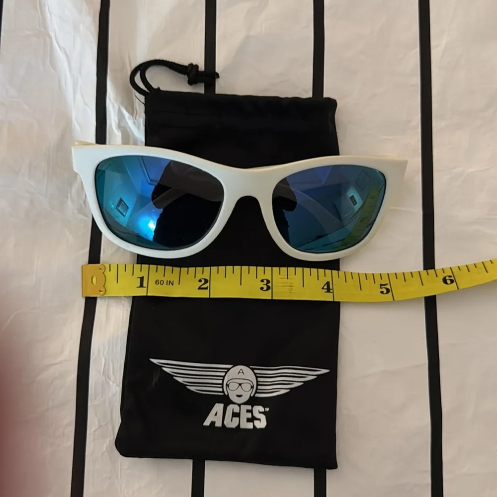 ACES Children’s sunglasses and bag NEVER WORN.